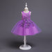 Girls sleeveless dress with floral embroidery on sweet solid coloured fabric