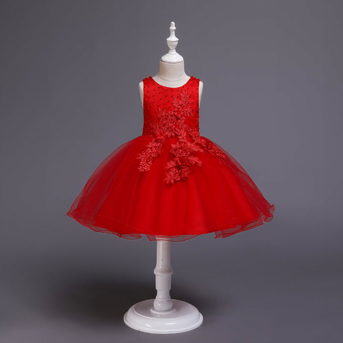 Girls sleeveless dress with floral embroidery on sweet solid coloured fabric