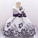 Stylish and comfy baby dress featuring floral embroidery and a classic sleeveless look